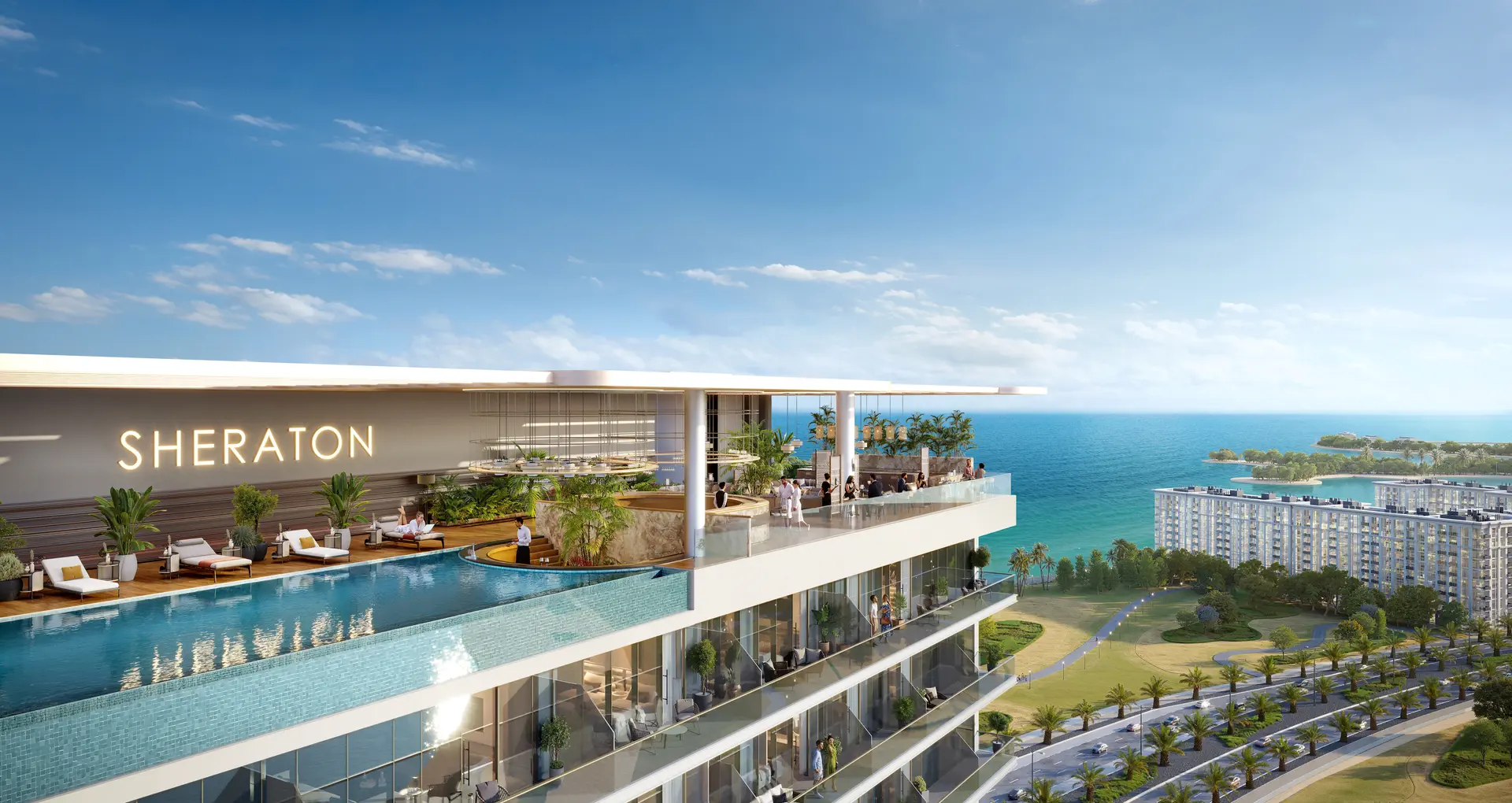 Rooftop infinity pool with panoramic sea views at Sheraton Residences Al Marjan Island Ras Al Khaimah